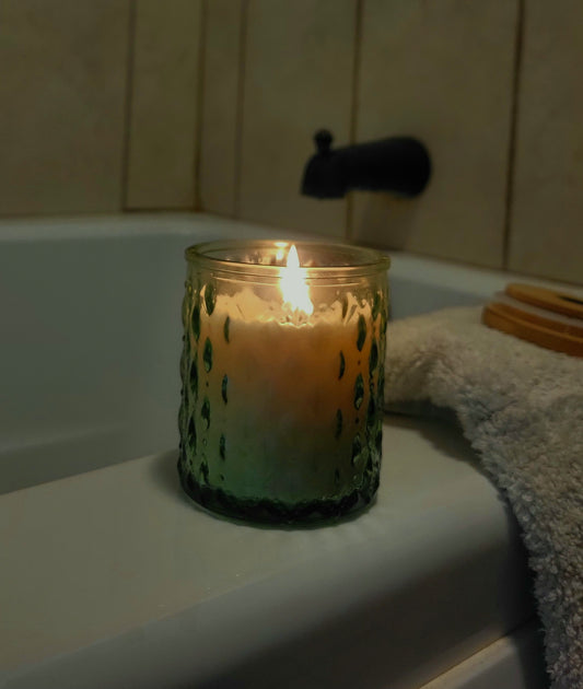 Green glass 7oz jar with beeswax-coconut oil candle, scented only with pure essential oils, mint, energizing, clarifying clean scent  made without parrafin or soy, and no artificial or synthetic fragrances